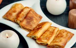Hrskave spolja, mekane iznutra: Savršen recept za pohovane palačinke iz rerne!